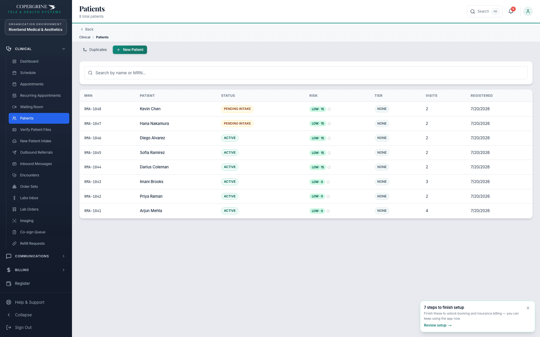Patient roster with MRN, status, tier, visit count and registration date columns